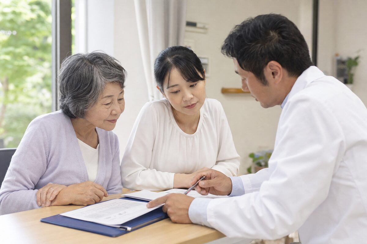 直腸がんの年齢や家族歴について患者家族と医療者が相談する様子