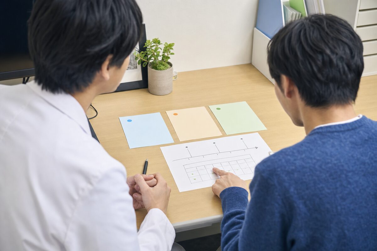 直腸がんの治療選択について医師と患者が話し合う様子